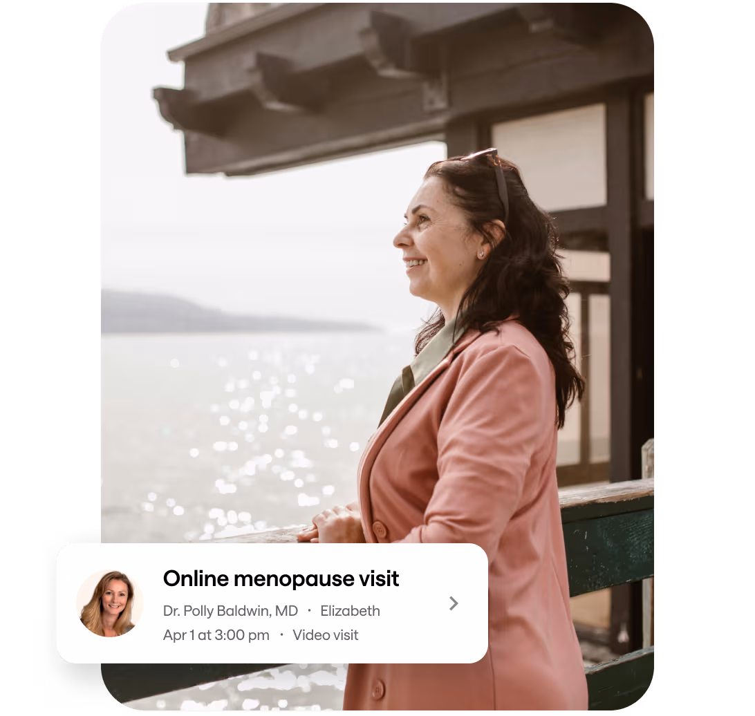 Woman enjoying waterfront view with an online menopause appointment reminder from Sesame